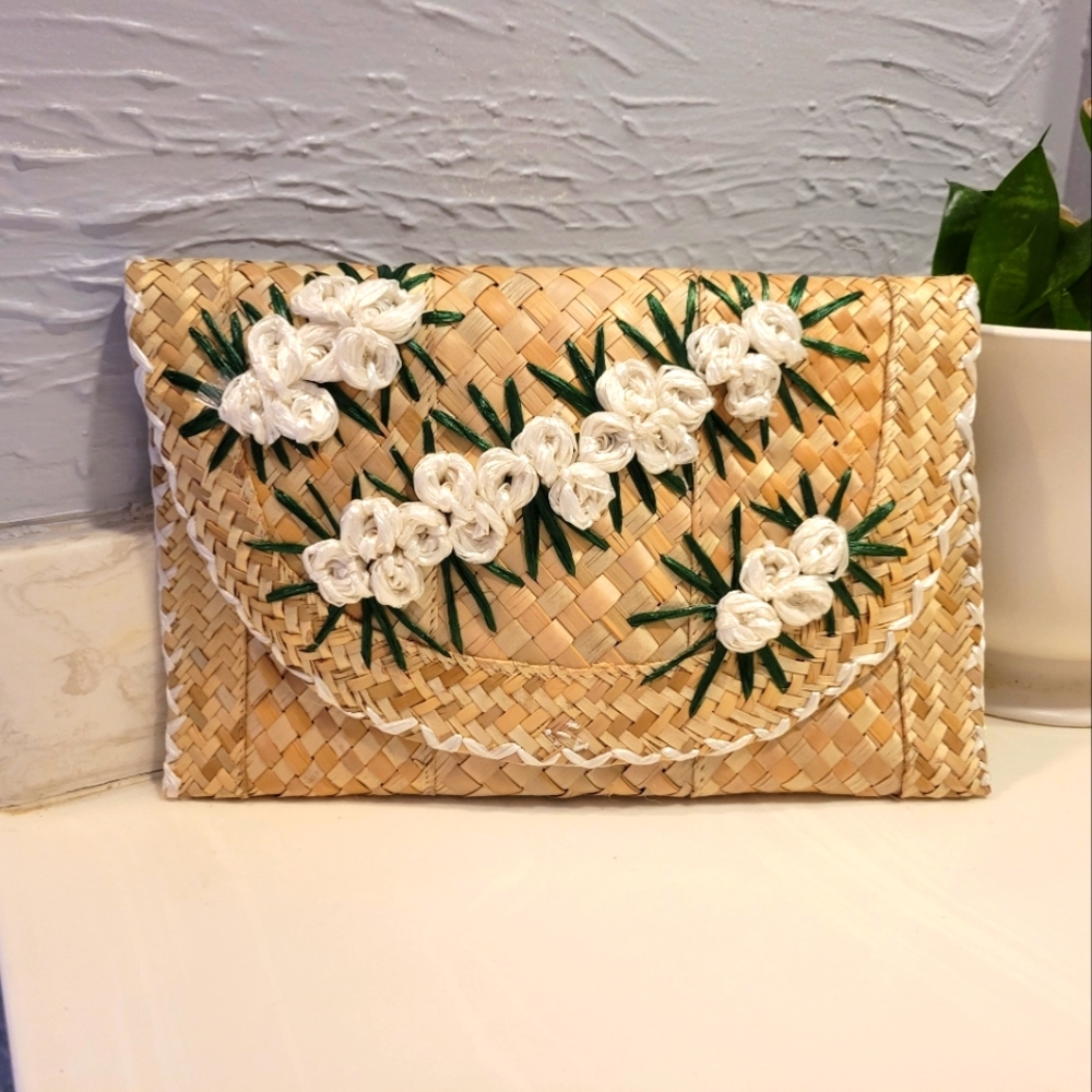 Woven and embroidered straw clutch purse